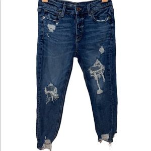American Eagle high waisted distressed Tomgirl jeans with frayed ankles